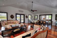 Great Hall living area with dining area in background