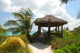 Our beachfront tiki hut with hammock. Chairs also available.